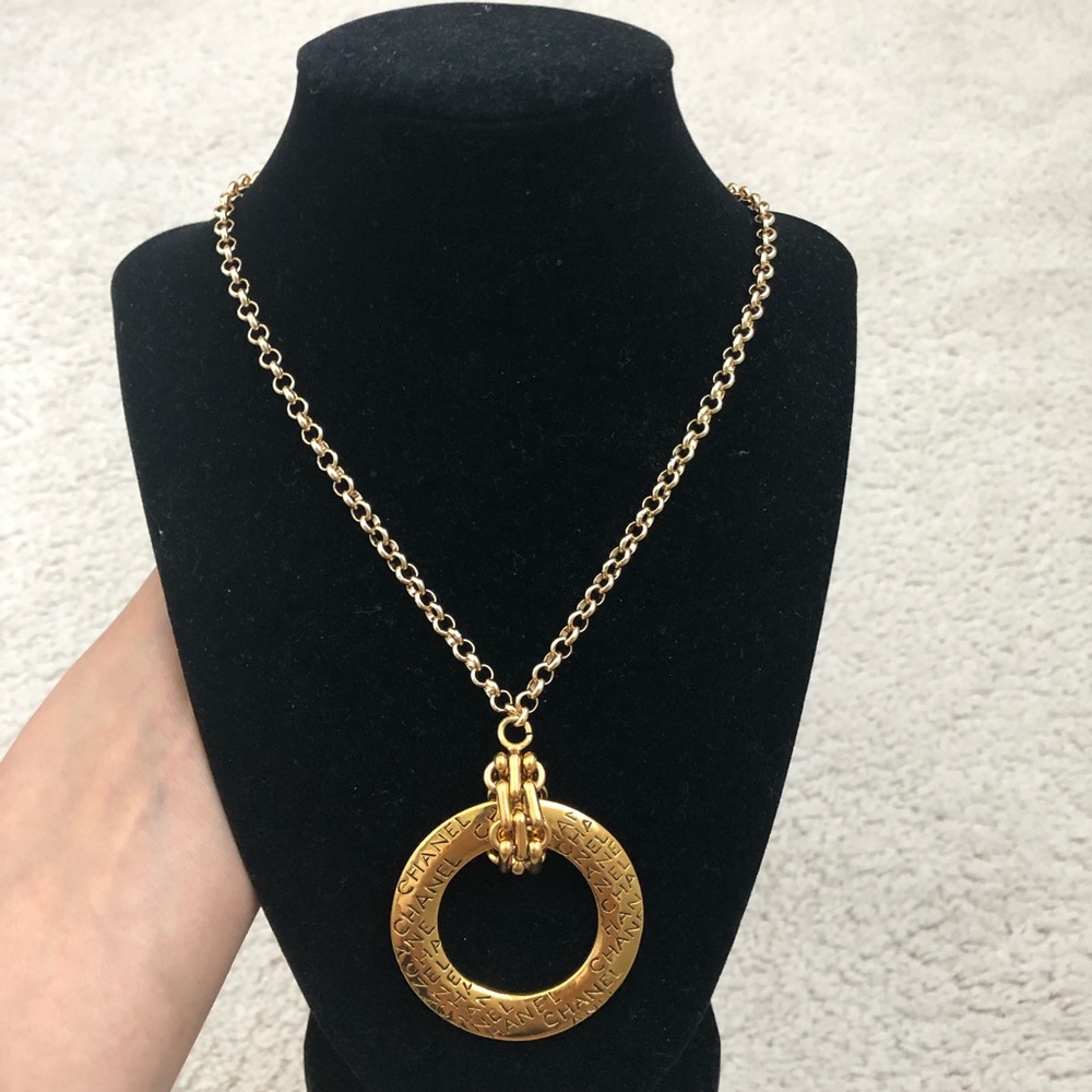 - Auth Chanel pendent with 18k gold flat necklace